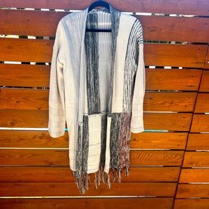 Like new, long sleeve open sweater with fringe. XL.